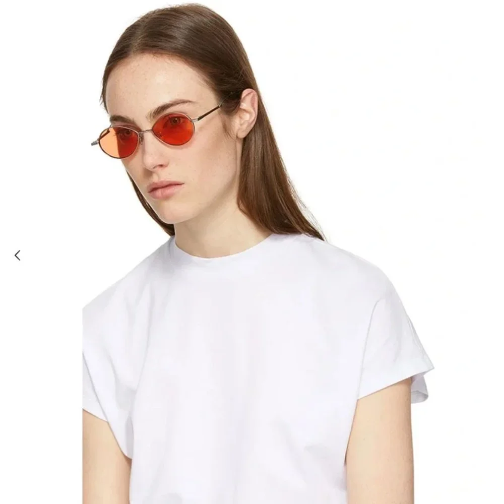 GENTLE MONSTER Oval Silver Frame Sunglasses with Orange Lenses
